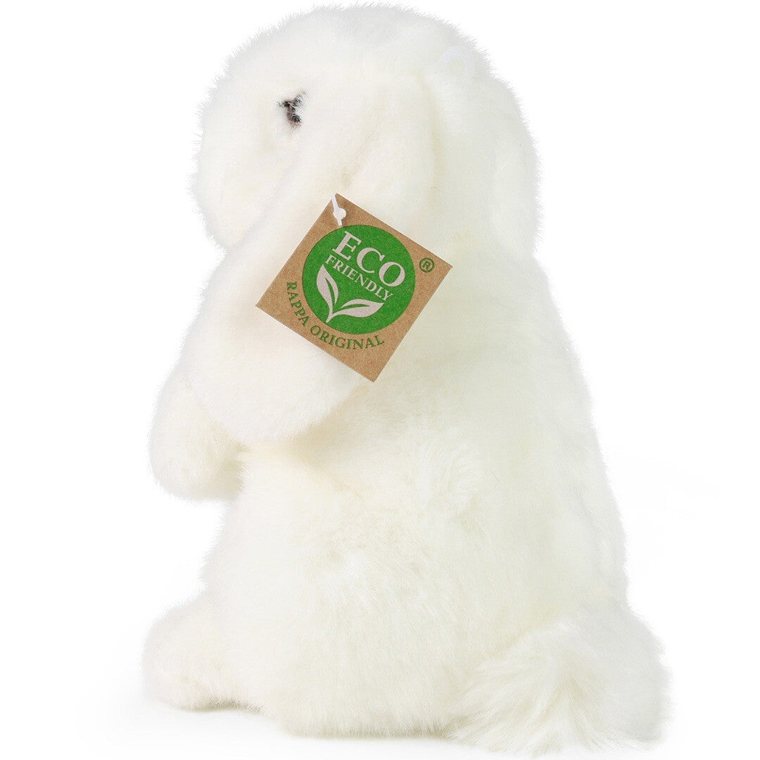 Achterkant van het witte pluchen konijn met pluizige staart en 'Eco Friendly' label.