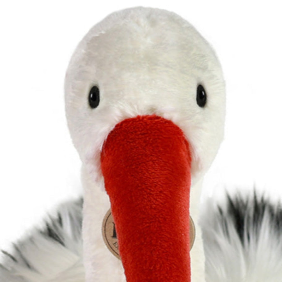 Close-up van de kop van de Rappa knuffelooievaar met rode snavel en zwarte ogen.