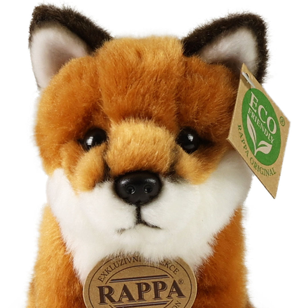 Close-up van de kop van de Rappa knuffelvos met zichtbare labels.