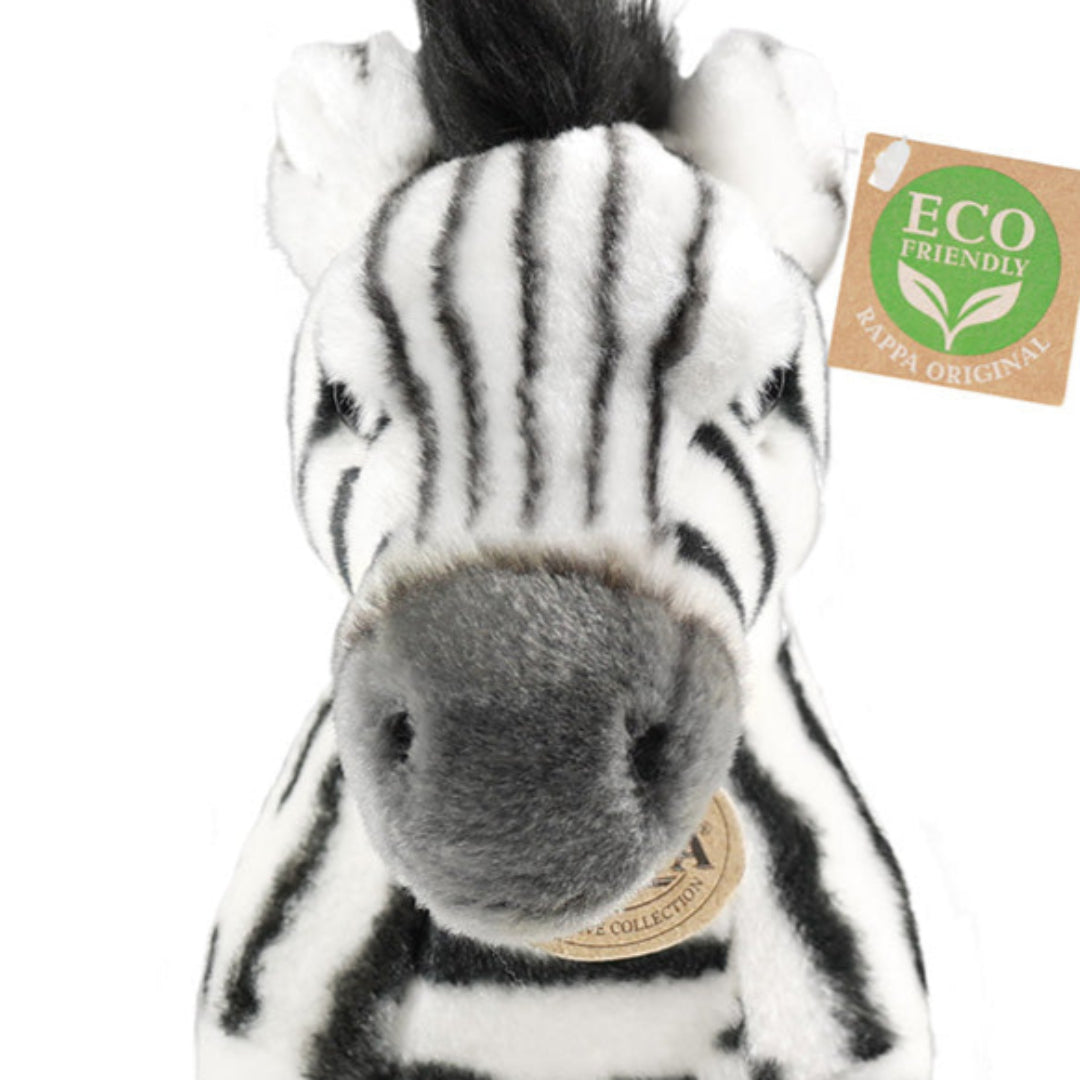 Detailopname van de kop van de Rappa pluchen zebra knuffel.
