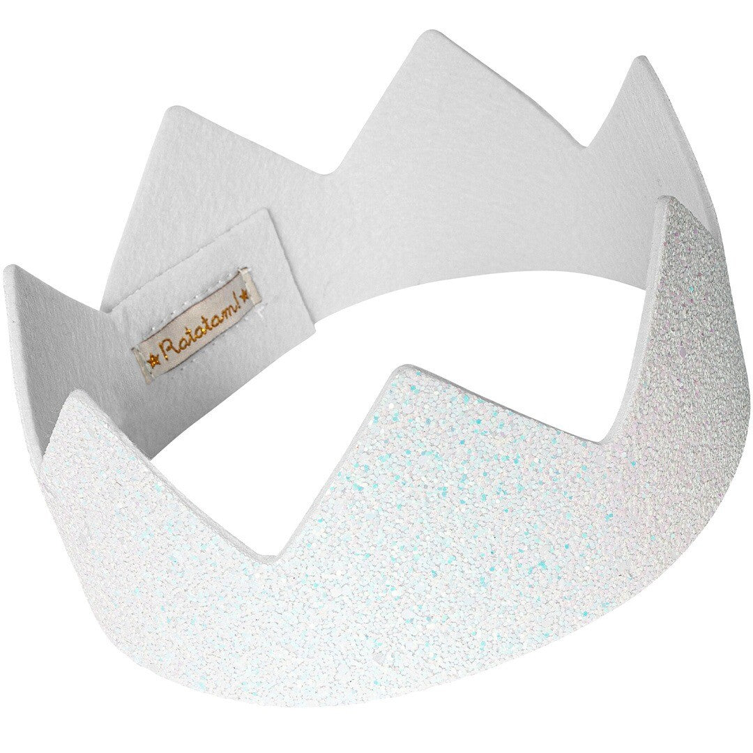 Ratatam witte kroon met glittertextuur, schuin gefotografeerd.