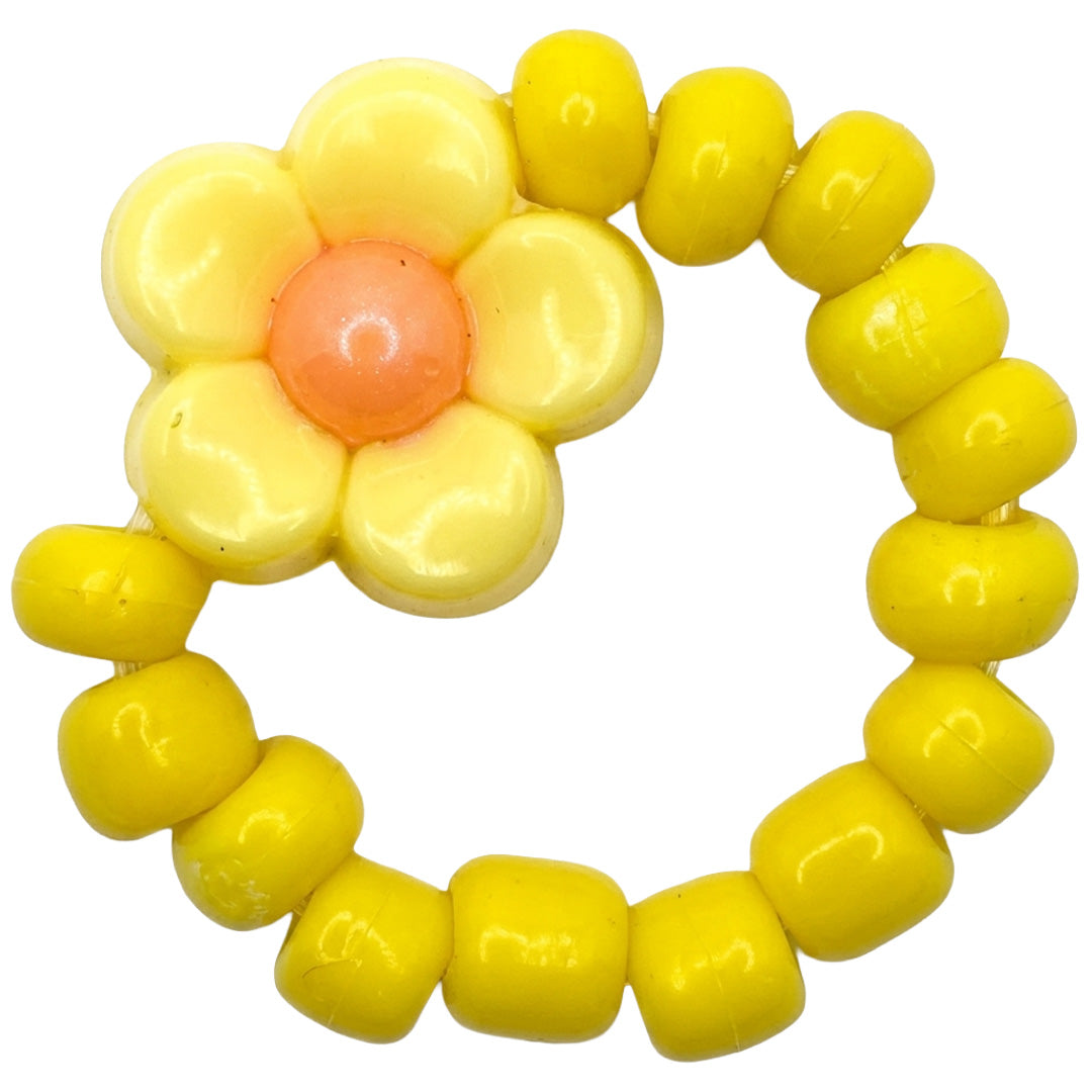 Ratatam gele kinderring met bloem.