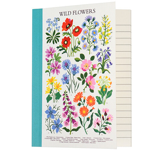 Rex London A6 notitieboekje met wilde bloemen op de voorkant en zicht op de gelinieerde pagina's.