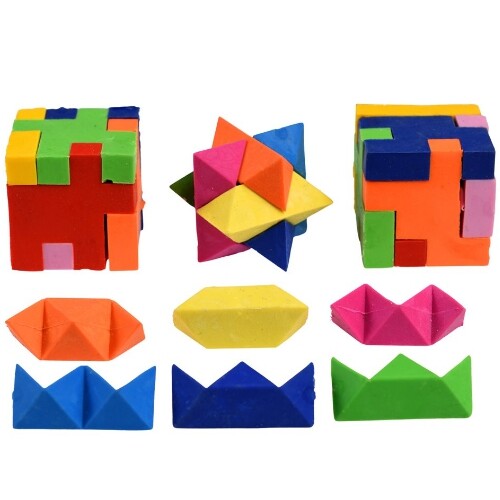 Drie veelkleurige Rex London 3D puzzel gummen, twee kubusvormig en één stervormig, met zes losse puzzelstukken eronder.