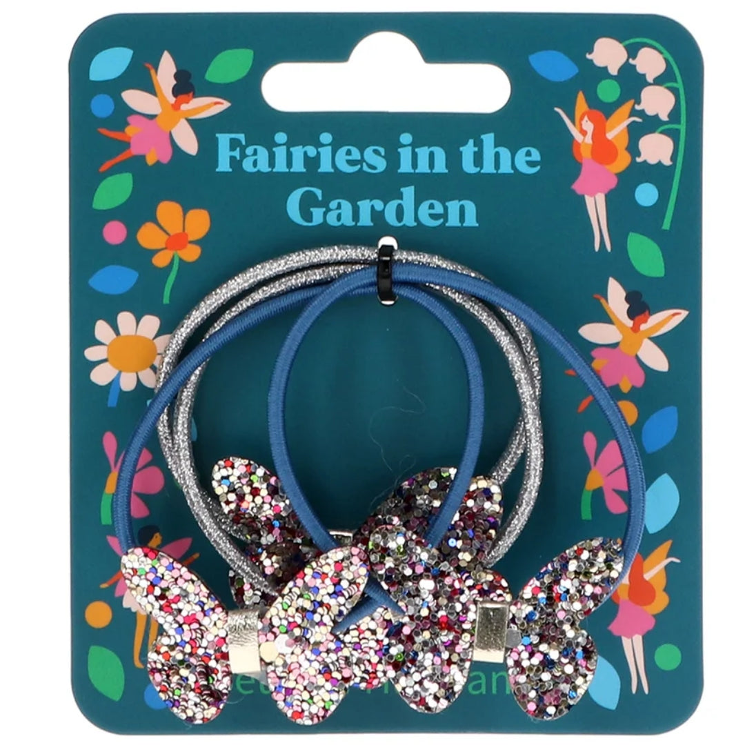 Rex London kinder haarelastiekjes met glittervlinders op een verpakking met 'Fairies in the Garden' thema.