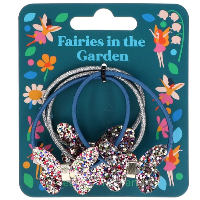 Rex London kinder haarelastiekjes met glittervlinders op een verpakking met 'Fairies in the Garden' thema.