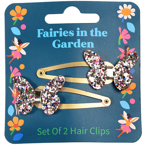 De verpakking van de Rex London haarspeldjes met vlinders, met de tekst "Fairies in the Garden".