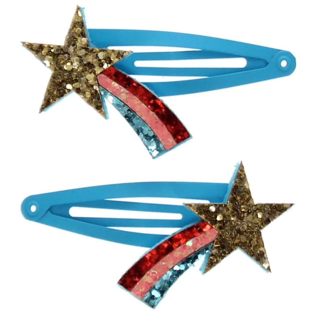 Twee Rex London blauwe haarspeldjes met gouden glitter sterren en een glitter regenboog.