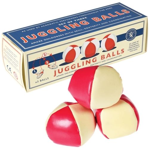 Rex London jongleerballen set van drie in rood en crème, met de verpakking ernaast.
