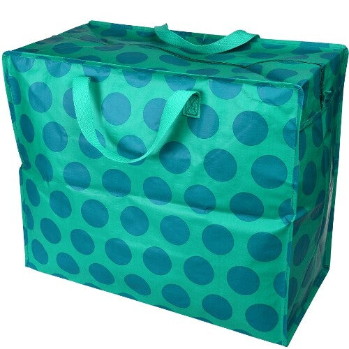 Rex London jumbo opbergtas van plastic, groen met blauwe stippen, schuin van bovenaf gezien.