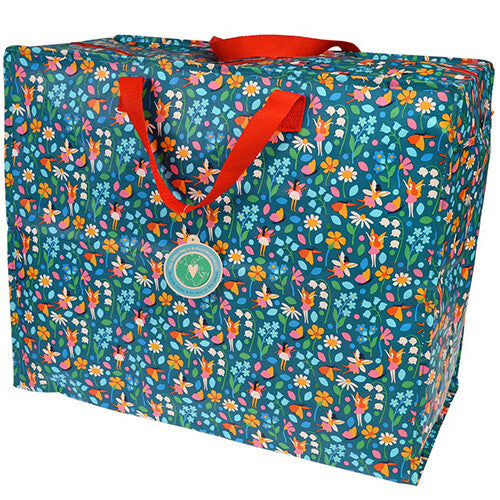 Rex London jumbo opbergtas met een patroon van bloemen en feeën op een blauwe achtergrond.