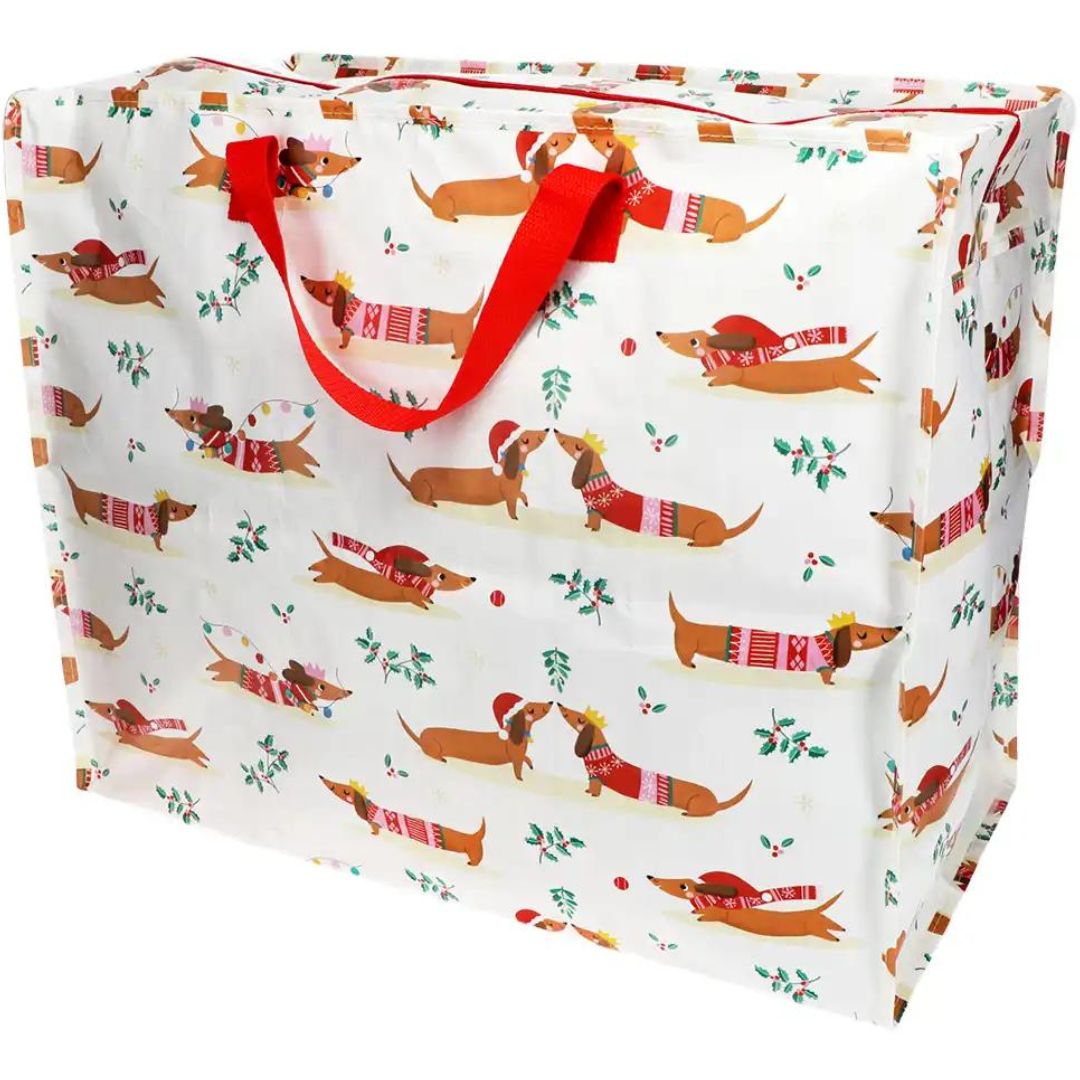 Rex London jumbo opbergtas met een kerstpatroon van worsthondjes en rode handvatten.