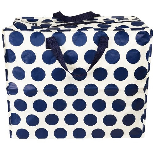 Rex London jumbo opbergtas met navy blauwe stippen op een witte achtergrond, van de voorkant gezien.