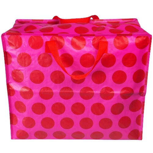 Rex London jumbo opbergtas met rode stippen op roze, van voren gefotografeerd.