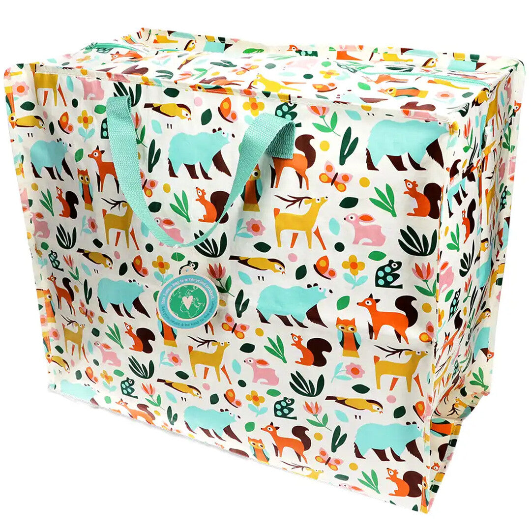 Rex London jumbo opbergtas met kleurrijk woodland dierenpatroon, schuin gefotografeerd.
