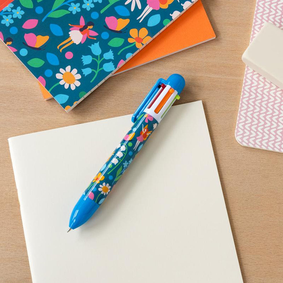 Rex London 6-in-1 kleurenpen met elfjes en bloemen op een notitieboekje.