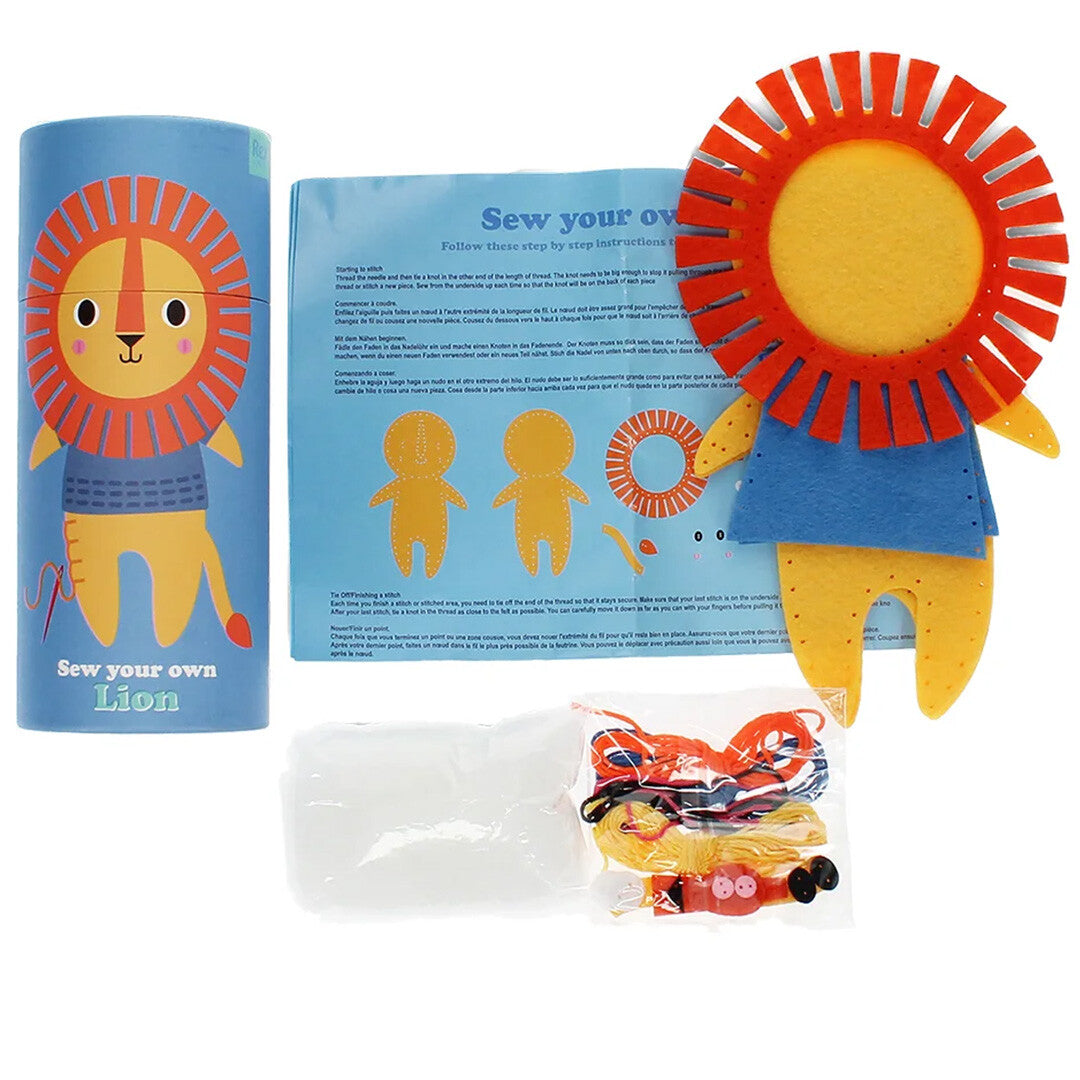 Rex London knutselpakket voor kinderen met de verpakking, instructies, deels afgewerkte vilten leeuw en materialen.