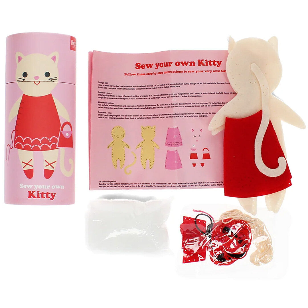 Rex London knutselpakket met de roze verpakking, een instructieboekje, de vilten poes en de losse materialen.