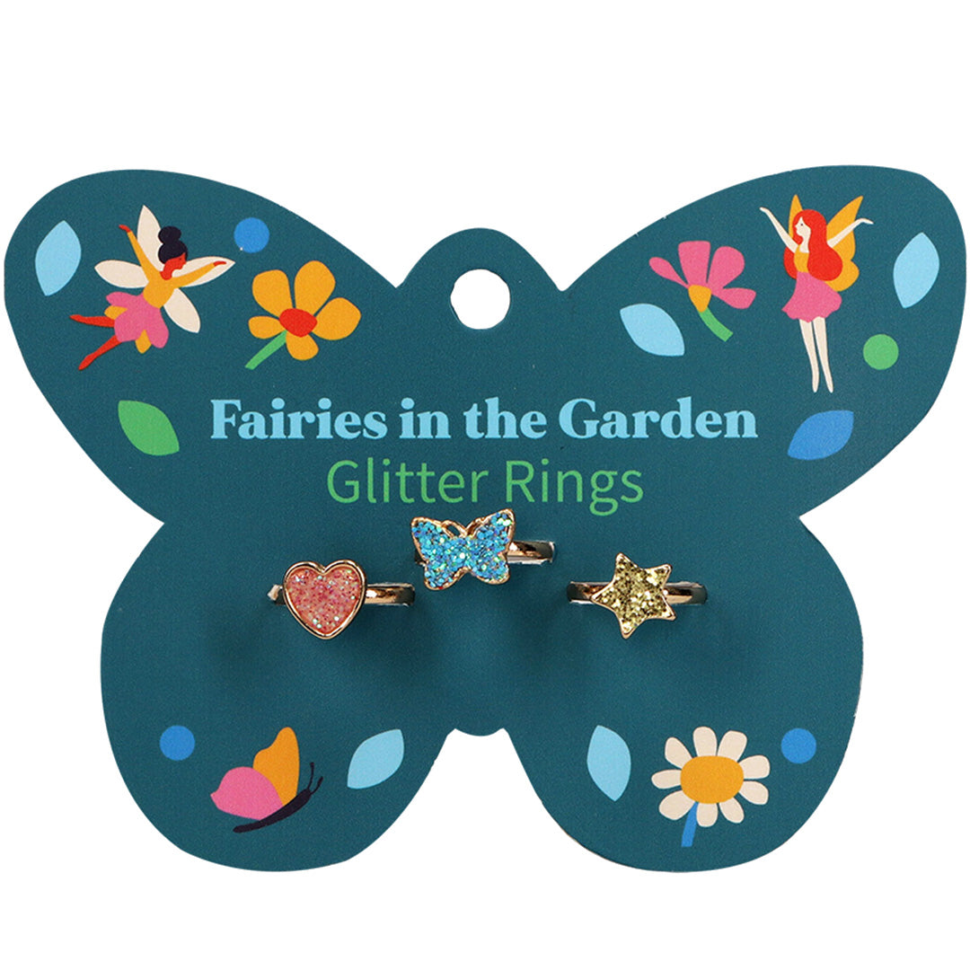 Rex London verpakking met drie Fairies in the Garden kinderringen: een glitter hart, een glitter vlinder en een glitter ster.