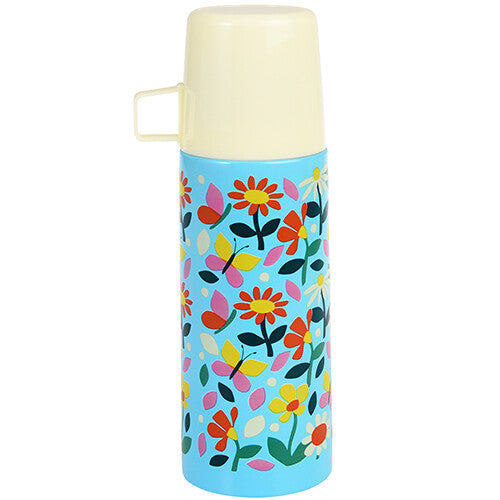 Rex London RVS thermosfles met bloemen- en vlinderpatroon en crèmekleurige beker erop.