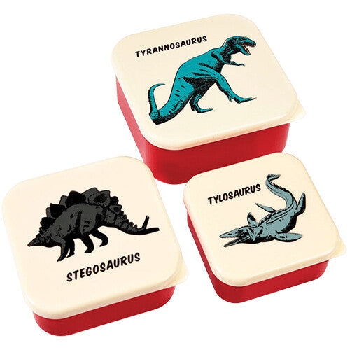 Drie Rex London snackdoosjes met deksels met illustraties van een Tyrannosaurus, Stegosaurus en Tylosaurus.