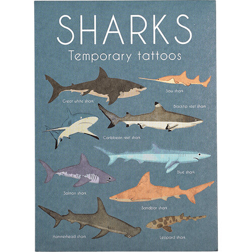 Een blauw vel met illustraties van verschillende haaien en de tekst 'SHARKS Temporary tattoos'.