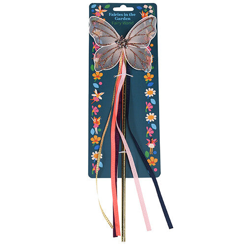De Rex London toverstaf met vlinder en linten op de verpakking met bloemenpatroon.