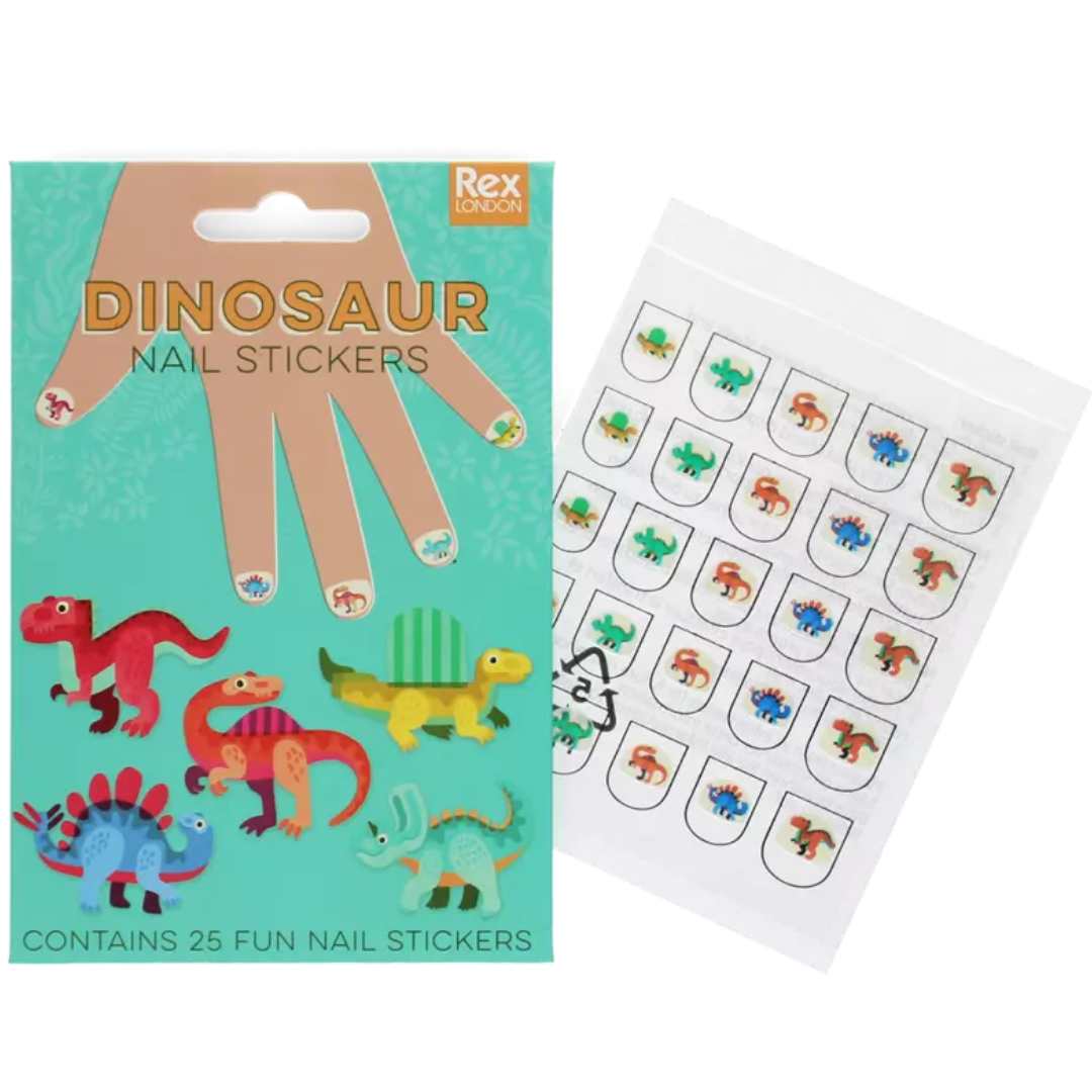 De Rex London dinosaurus nagelstickers verpakking ligt schuin naast een vel met diverse dinosaurus nagelstickers.