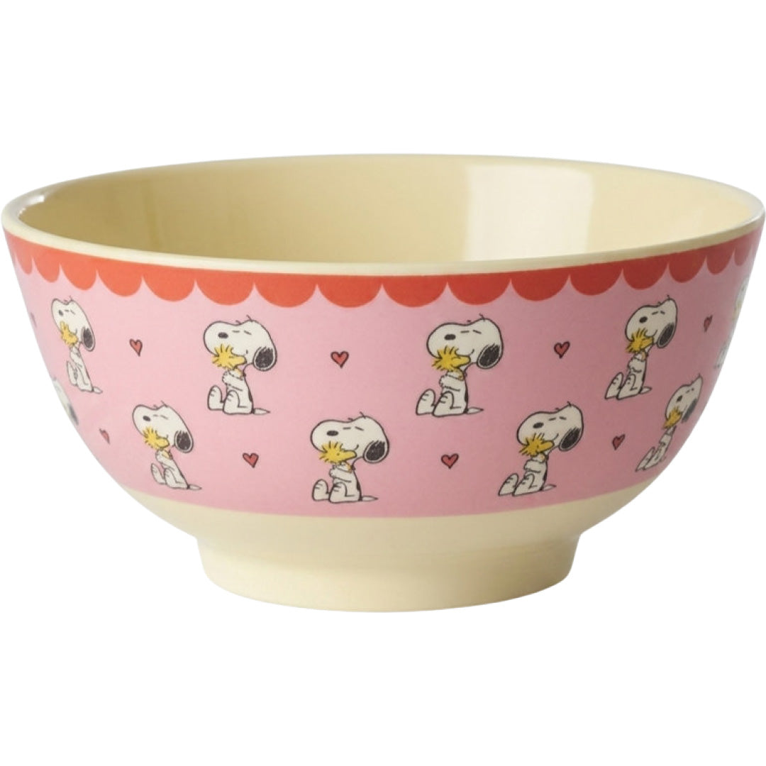 Roze rice kinderkom van melamine met Snoopy figuren.