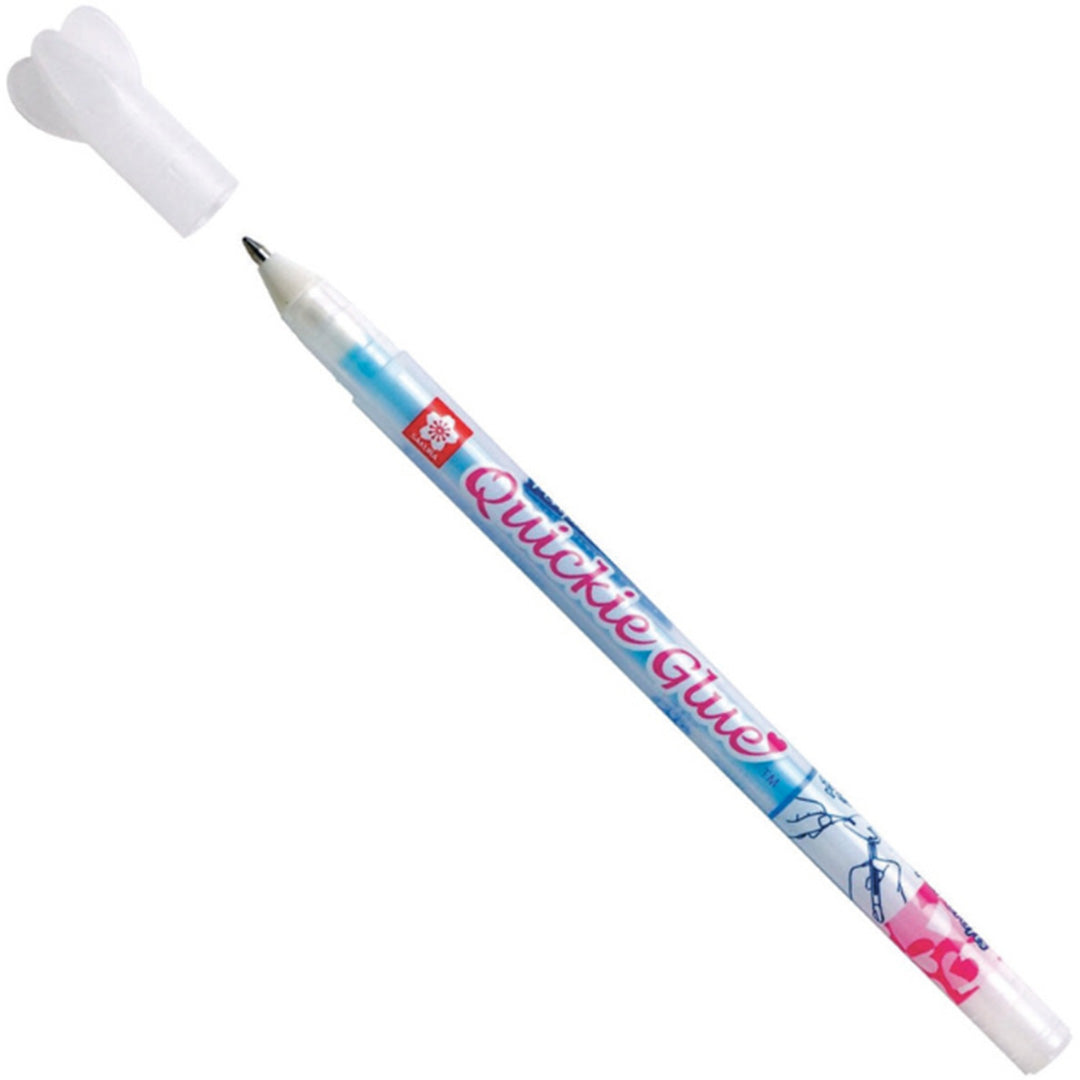 Sakura Quickie Glue lijmpen met de dop eraf.