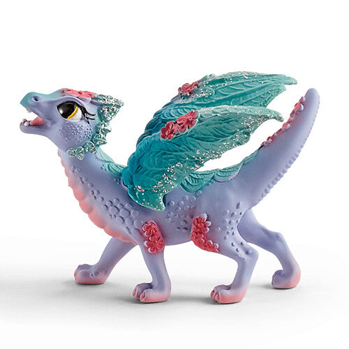 Schleich Bayala baby bloemendraak speelgoedfiguur, blauw met roze bloemen en glitterende teal vleugels.