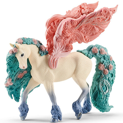 Schleich Bayala bloemenpegasus speelgoedfiguur met roze vleugels en een manen en staart versierd met bloemen.