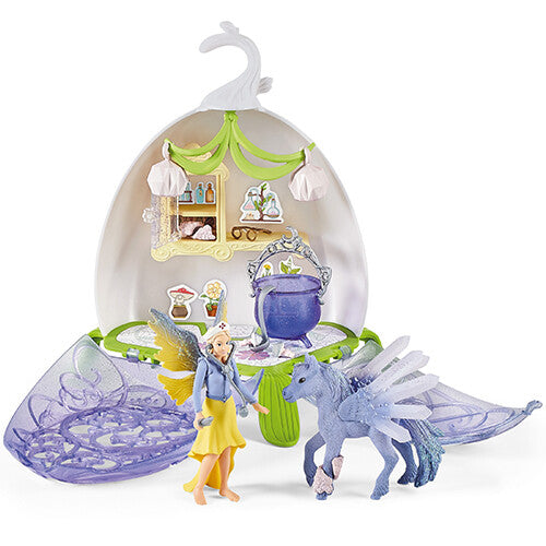Schleich Bayala dierenarts bloem speelset met elfenfiguur en gevleugeld paard.