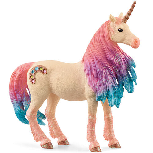 Schleich eenhoorn speelgoedfiguurtje met beige lichaam, roze-paars-blauwe manen en staart, en een regenboog op de flank.