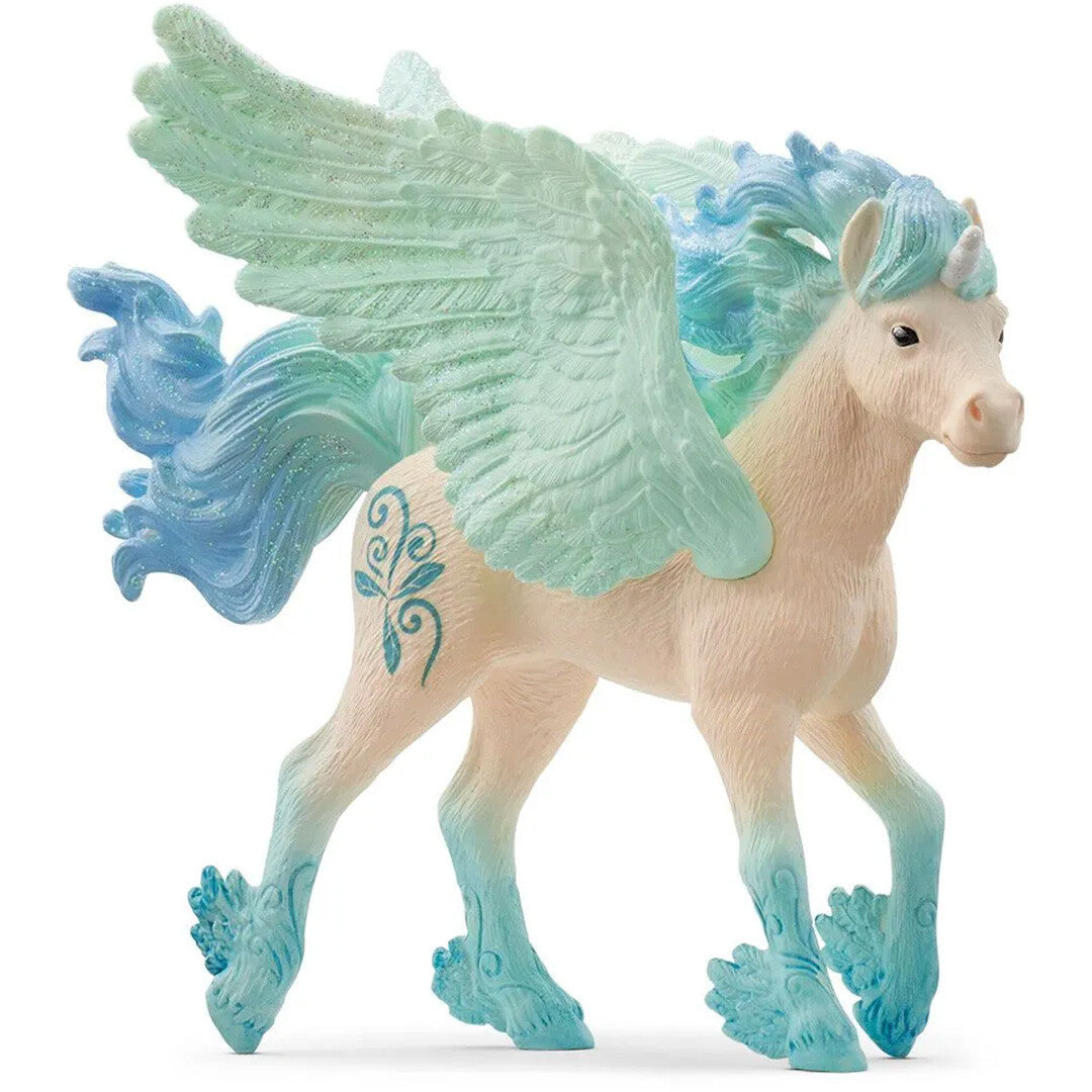 Schleich bayala eenhoorn veulen Stormy speelfiguur, beige met blauwgroene manen en vleugels.