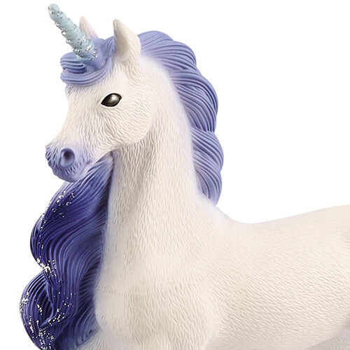 Detailfoto van de kop en manen van de Schleich eenhoorn met glitterhoorn.