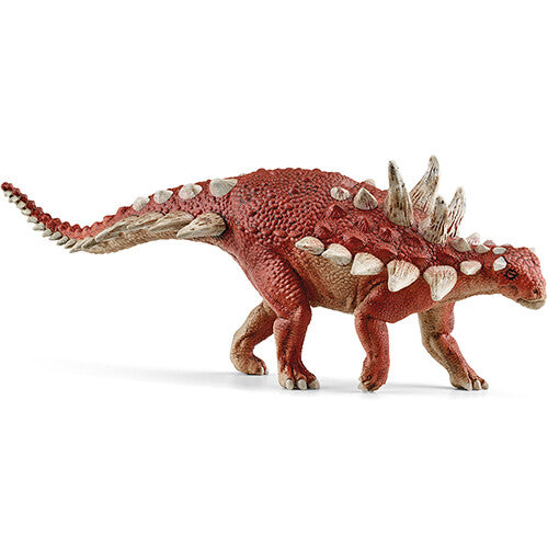 Schleich Gastonia dinosaurusspeelfiguur in rood met beige stekels.