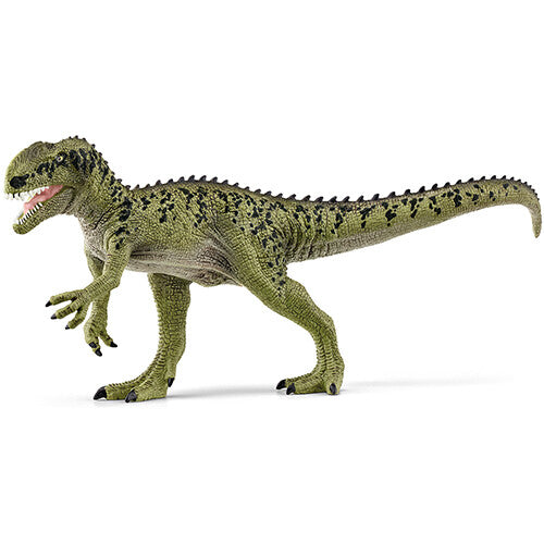 Schleich plastic dinosaurusfiguur van een groene Monolophosaurus, van de zijkant gefotografeerd.