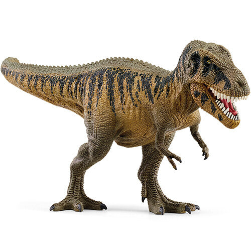 Schleich Tarbosaurus dinosaurus speelgoedfiguur, beige met zwarte strepen, schuin van voren gefotografeerd.