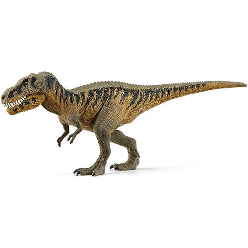 Zijaanzicht van het Tarbosaurus dinosaurus speelgoedfiguur, staand op een witte achtergrond.
