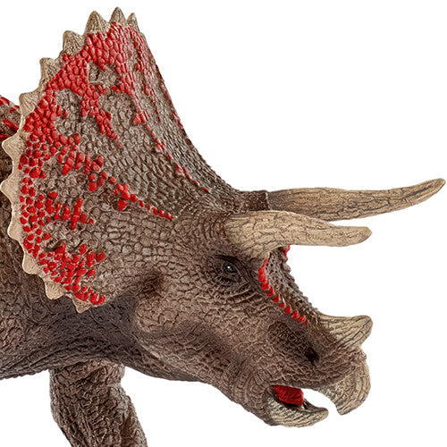 Detailfoto van de kop van het triceratops dinosaurus speelgoedfiguur.