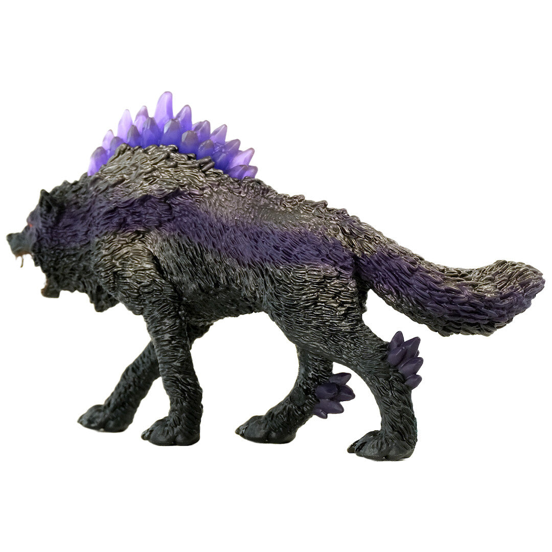 Schleich Eldrador Creatures schaduwwolf dierenfiguurtje met paarse kristallen, van de linkerzijkant gefotografeerd.