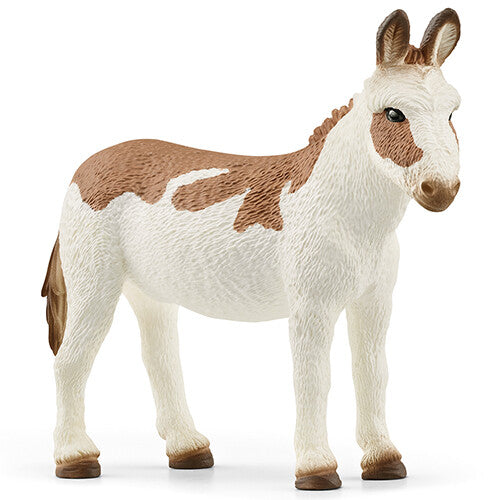 Schleich dierenfiguurtje van een Amerikaanse gevlekte ezel, staand.