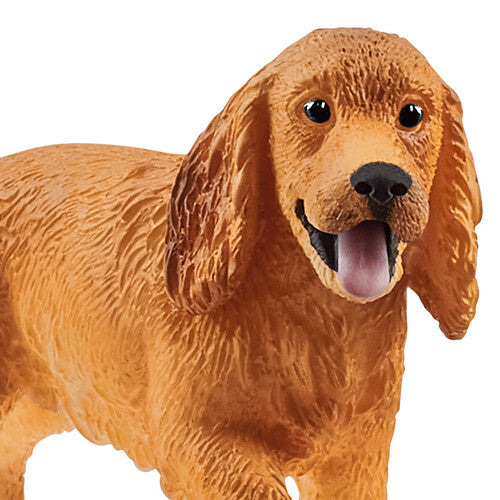 Detailopname van de kop van het bruine Engelse cockerspaniël dierenfiguurtje.