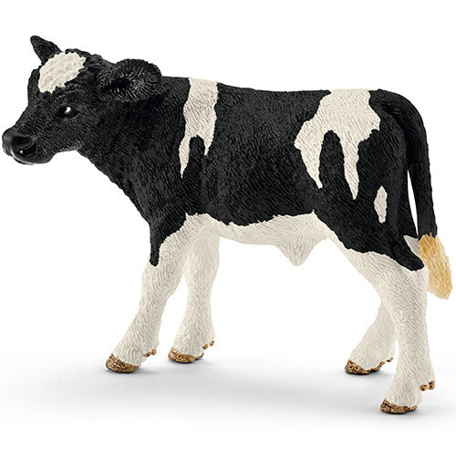Schleich Holstein zwartbont kalf speelgoedfiguur, staand en van de zijkant gefotografeerd.