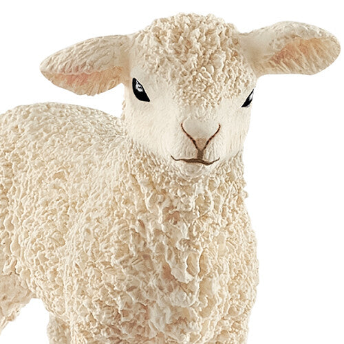 Detailfoto van het Schleich plastic dierenfiguurtje van een lam, met focus op de kop en vachttextuur.