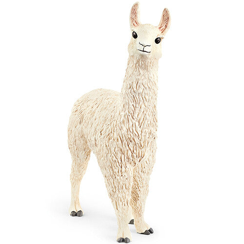 Schleich dierenfiguurtje van een beige lama, schuin van voren gefotografeerd.