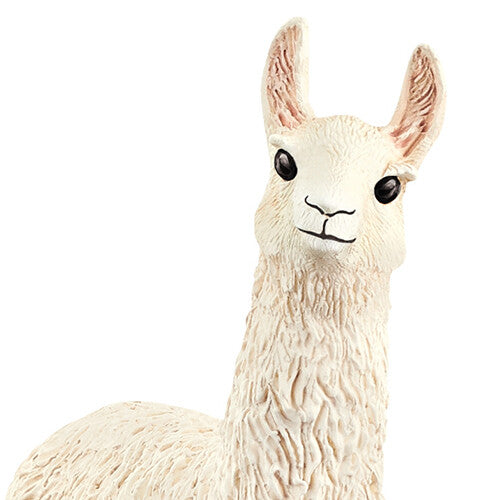 Detailopname van de kop en nek van het lama dierenfiguurtje.