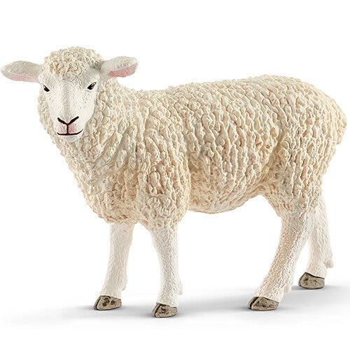 Schleich dierenfiguurtje van een beige schaap, staand.