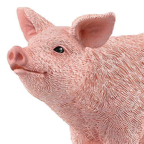 Detailopname van de kop van het Schleich roze varken dierenfiguurtje.